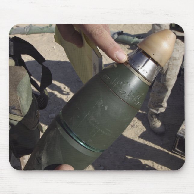A squad leader points to a delay setting mouse pad (Front)