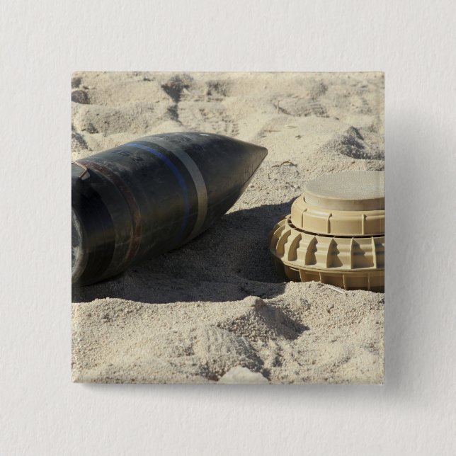 A static display of a converted ordnance shell button (Front)