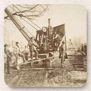 A steam crane in operation during the building of beverage coaster