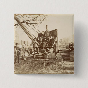 A steam crane in operation during the building of button