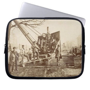 A steam crane in operation during the building of laptop sleeve