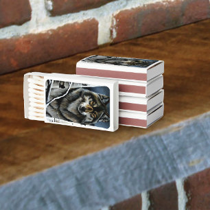 A striking and soulful portrayal of a lone wolf em matchboxes