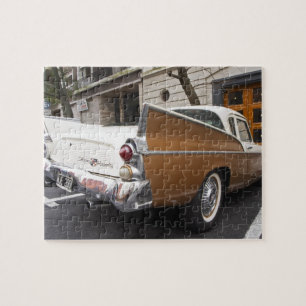 A Studebaker Silver Hawk Classic Car parked on a Jigsaw Puzzle