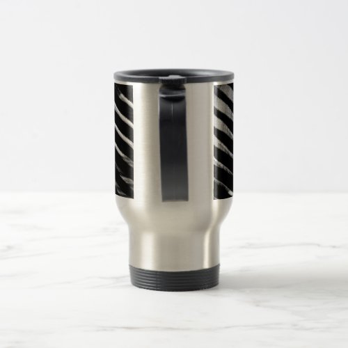 A stylish travel Mug with a handle  secure cover