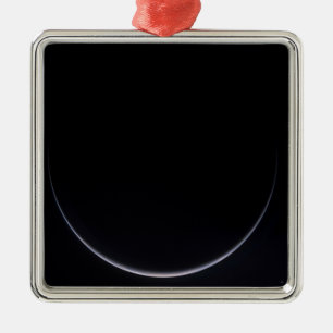 A sun-illuminated crescent of Earth Metal Ornament