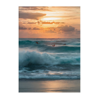 A surfer catching a wave during sunset. acrylic print