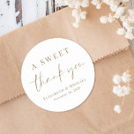 A Sweet Thank You Gold Script Wedding Favor Classic Round Sticker<br><div class="desc">A chic sticker for your wedding favors featuring "A Sweet Thank You" in a modern gold script and elegant gold typography,  your names and wedding date.</div>