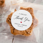 A Sweet Thank You Minimalist Wedding Favor  Classic Round Sticker<br><div class="desc">Make your guests feel appreciated with this Minimalist Wedding Thank You Favor Sticker! The sticker features a simple yet elegant design with the words "thank you" in a beautiful script font. It is perfect for adding a personal touch to your wedding favors, such as candy or small gifts. Use Zazzle's...</div>