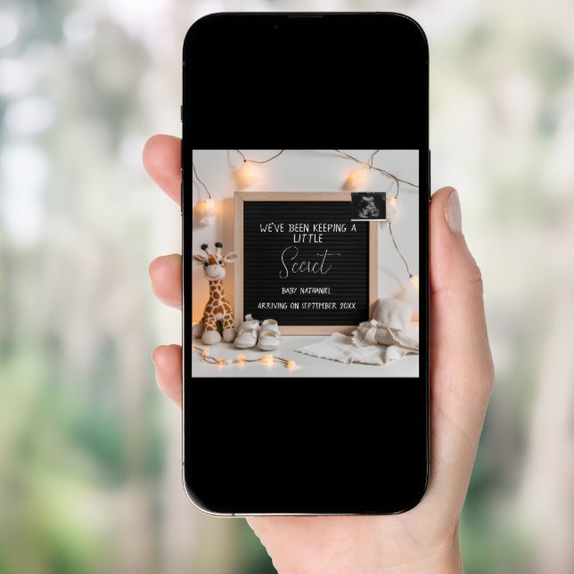 A sweetly sitting giraffe  pregnancy announcement  (Front Digital)