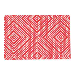 A symmetrical pattern featuring red, orange, and p placemat