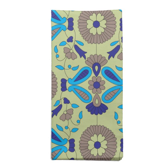 A symmetrical textile design featuring blue and or cloth napkin (Folded)