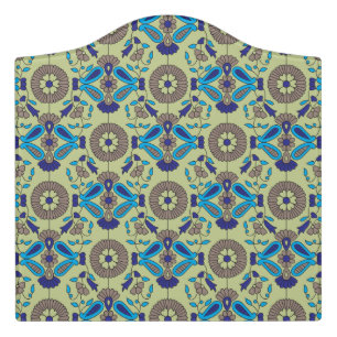A symmetrical textile design featuring blue and or door sign