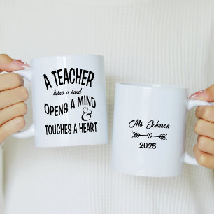 A teacher takes a hand, opens a mind coffee mug