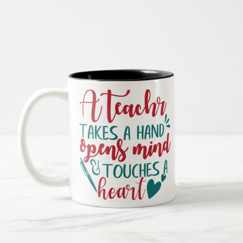 A teacher takes a hand opens mind  touches a hear Two_Tone coffee mug