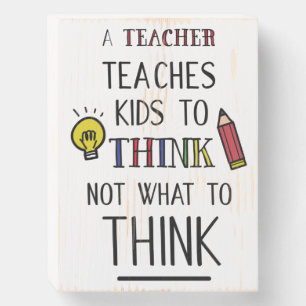 A teacher teaches kids to think not what to think wooden box sign