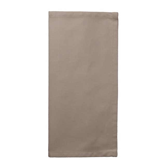 A textured background of various shades of brown,  cloth napkin (Half Fold)