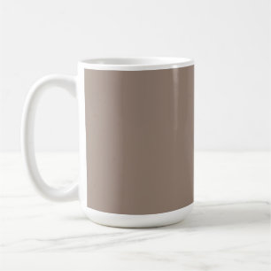 A textured background of various shades of brown, coffee mug
