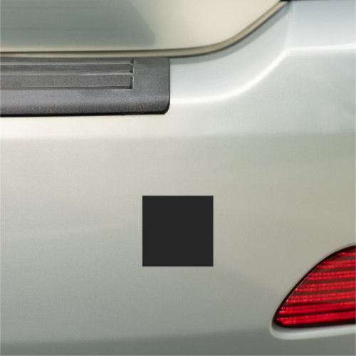 A textured black surface with subtle grain pattern car magnet