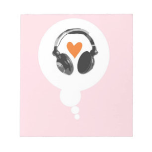 A thought bubble with a heart and headphones notepad