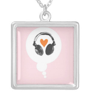 A thought bubble with a heart and headphones silver plated necklace