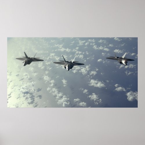A three_ship formation of F_22 Raptors Poster