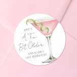 A Tini Bit Older Martini Birthday Classic Round Sticker<br><div class="desc">Tini Bit Older Birthday Round Sticker. This playful round sticker features a watercolor pink cosmopolitan martini glass with a lime twist inside on the right side, paired with the phrase “A Tini Bit Older” at the top in stylish handwritten script for a fun, cheeky vibe. The birthday person's name and...</div>