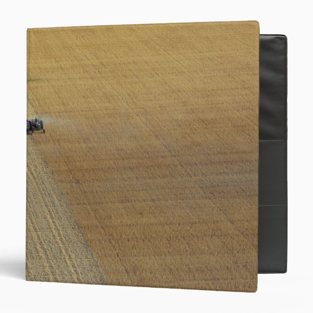 A tractor harvesting 3 ring binder (Front/Inside)