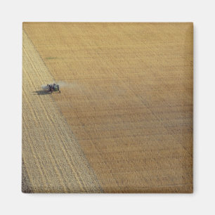 A tractor harvesting magnet