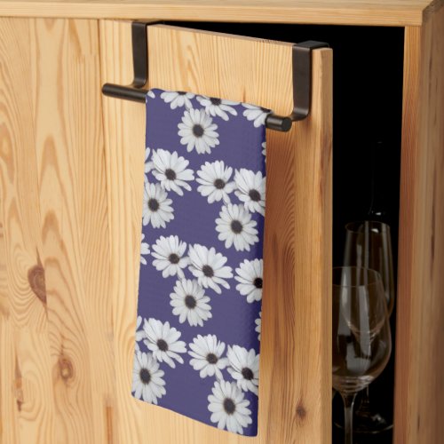 A Trio of African Daisies on Purple Kitchen Towel