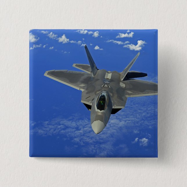 A US Air Force F-22 Raptor in flight near Guam Button (Front)