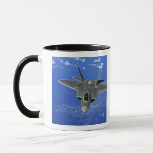 A US Air Force F_22 Raptor in flight near Guam Mug