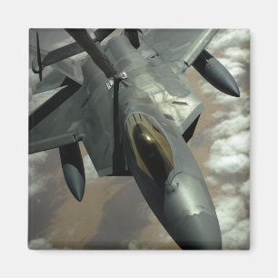 A US Air Force F-22 Raptor is refueled by a KC- Magnet