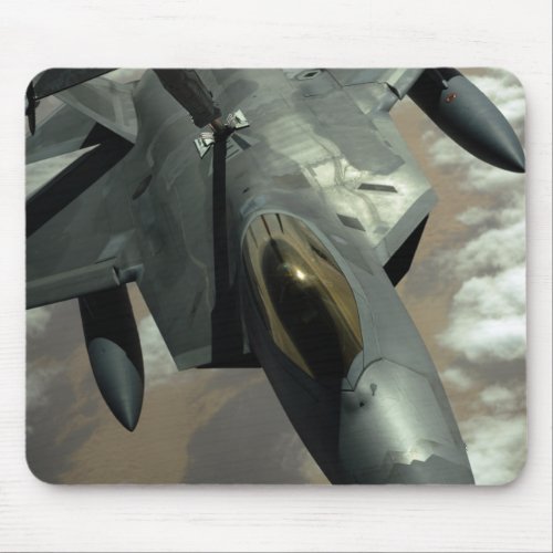 A US Air Force F_22 Raptor is refueled by a KC_ Mouse Pad