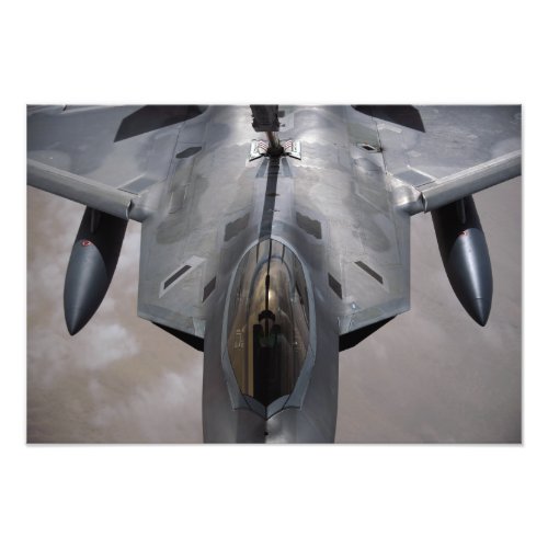 A US Air Force F_22 Raptor is refueled Photo Print