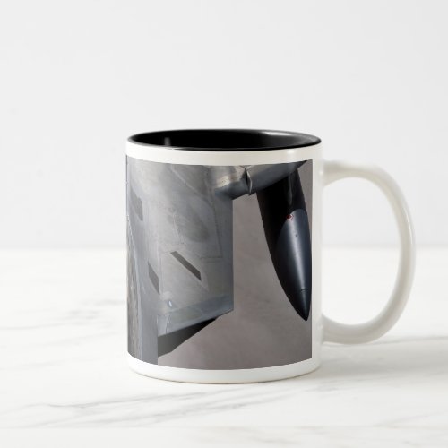 A US Air Force F_22 Raptor is refueled Two_Tone Coffee Mug