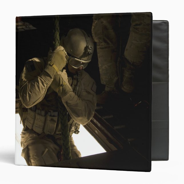 A US Air Force pararescueman begins his descent 3 Ring Binder (Front/Inside)
