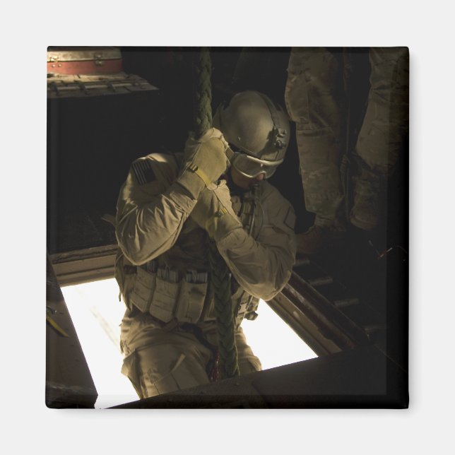 A US Air Force pararescueman begins his descent Magnet (Front)