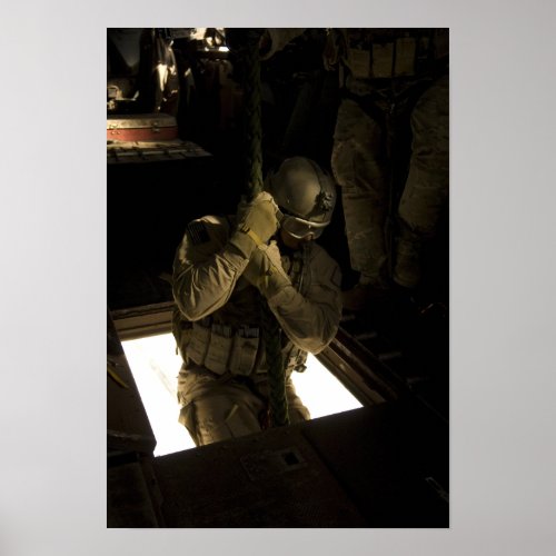 A US Air Force pararescueman begins his descent Poster