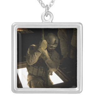 A US Air Force pararescueman begins his descent Silver Plated Necklace