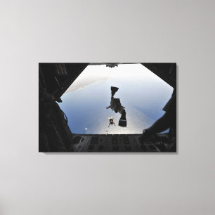 A US Air Force pararescueman jumping out Canvas Print