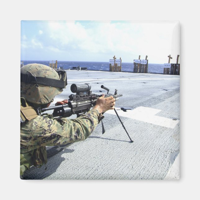A US Marine adjusting his weapon Magnet (Front)
