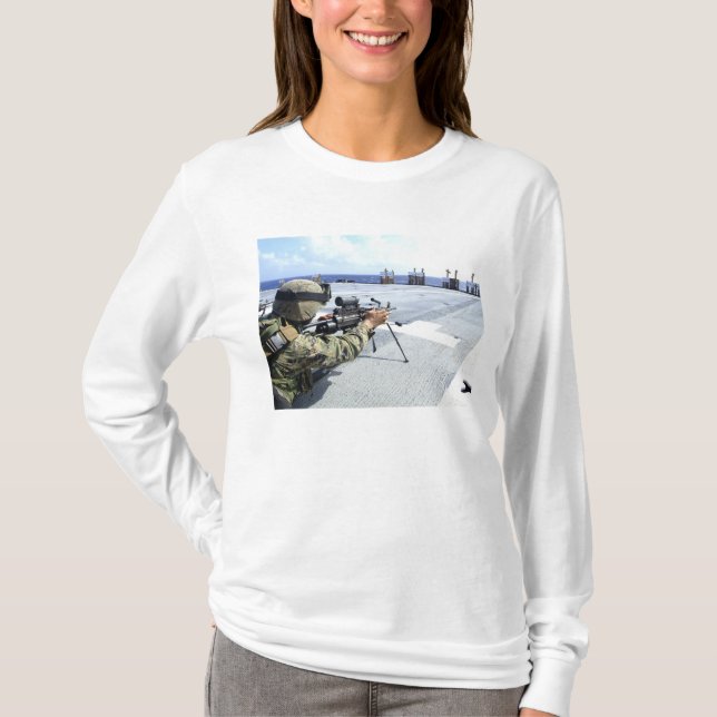 A US Marine adjusting his weapon T-Shirt (Front)