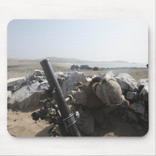 A US Marine fires a mortar in Salinas, Peru Mouse Pad