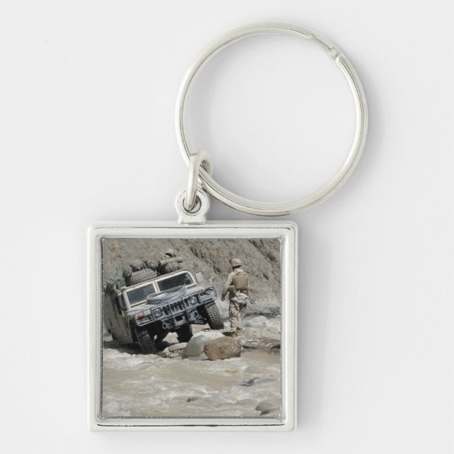 A US Marine guiding the driver of a Humvee Keychain (Front)