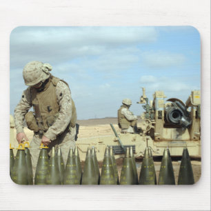 A US Marine prepares howitzer rounds to be fire Mouse Pad