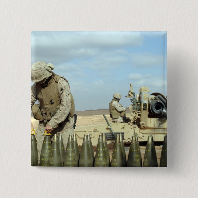 A US Marine prepares howitzer rounds to be fire Pinback Button (Front)