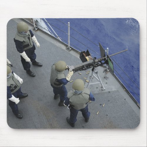 A US Sailor fires a 50_caliber M2HB Mouse Pad