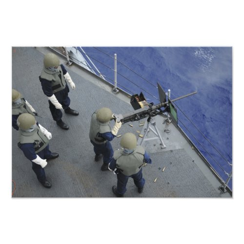 A US Sailor fires a 50_caliber M2HB Photo Print