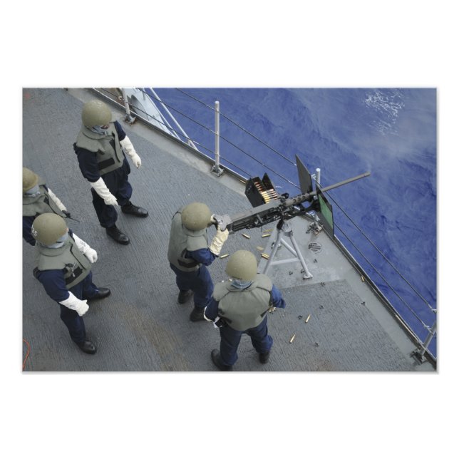 A US Sailor fires a 50-caliber M2HB Photo Print (Front)