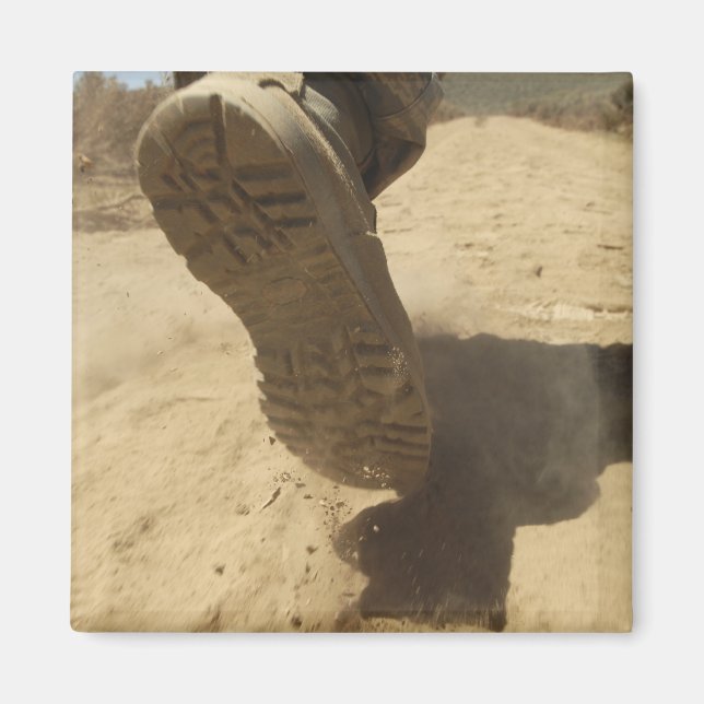 A US soldier walks along a dirt path Magnet (Front)